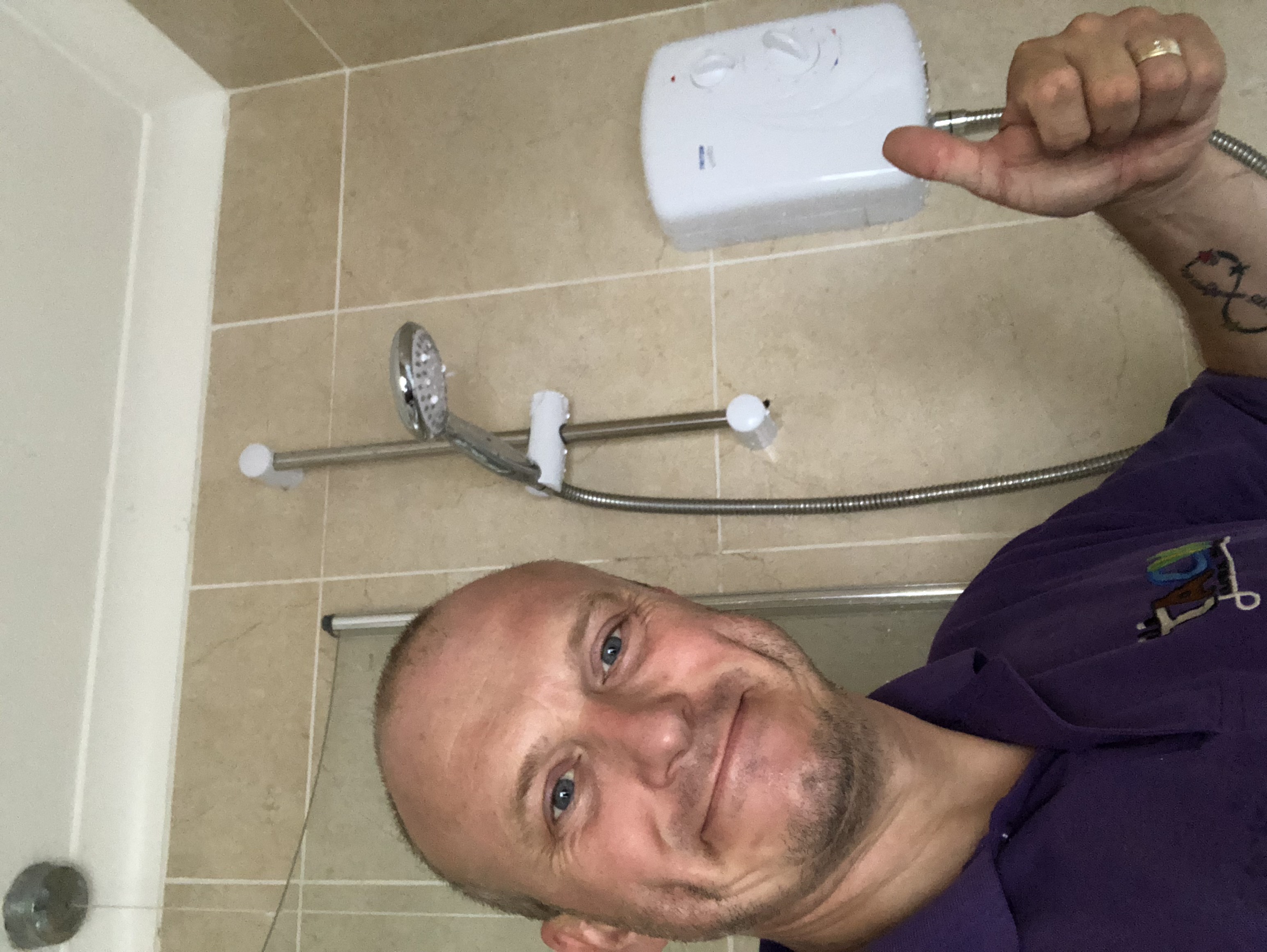 electrician changes shower loughton